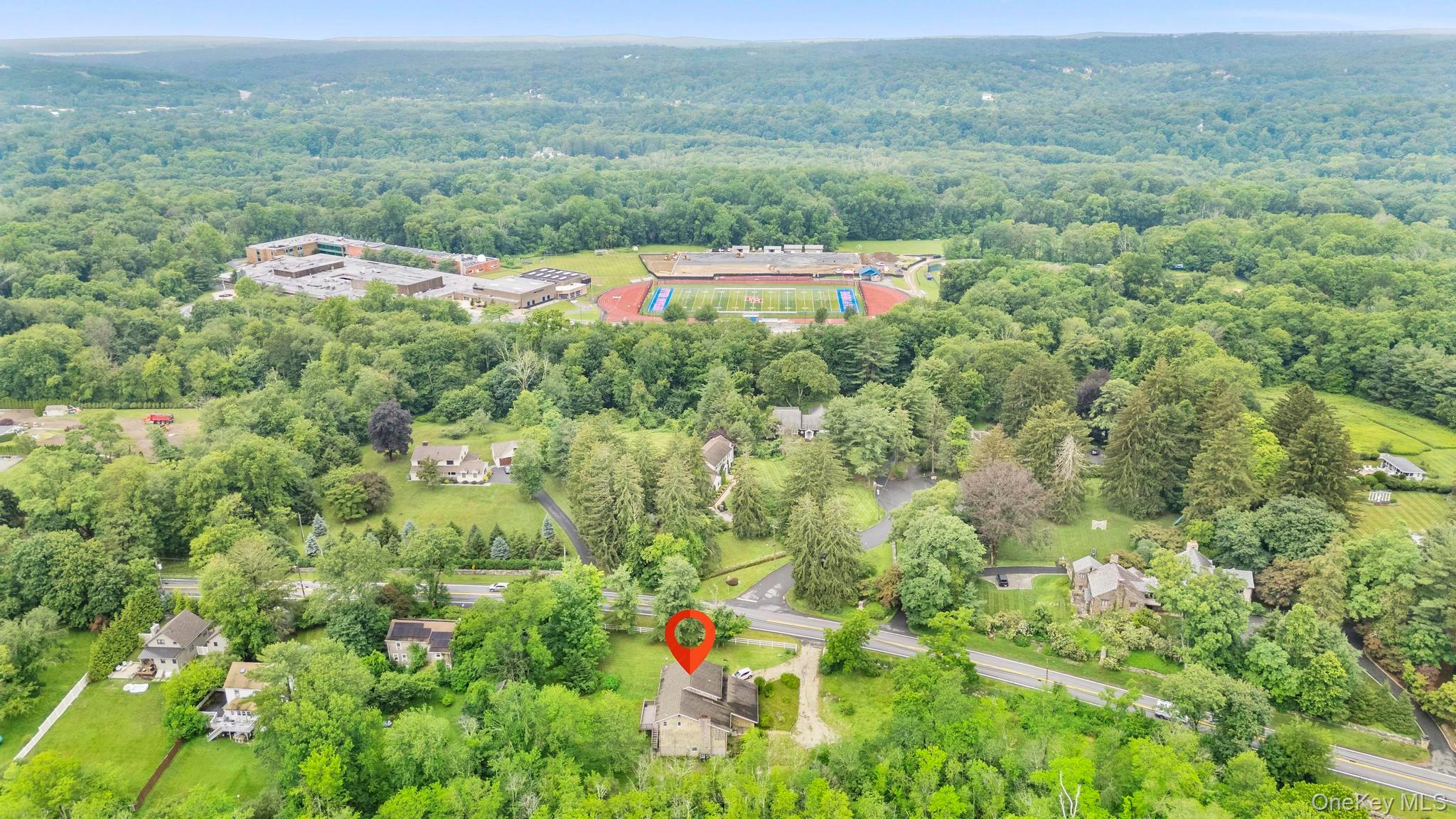 513 Bedford Road Armonk, NY 10504 - Photo 34 of 38 a view of a lush green field