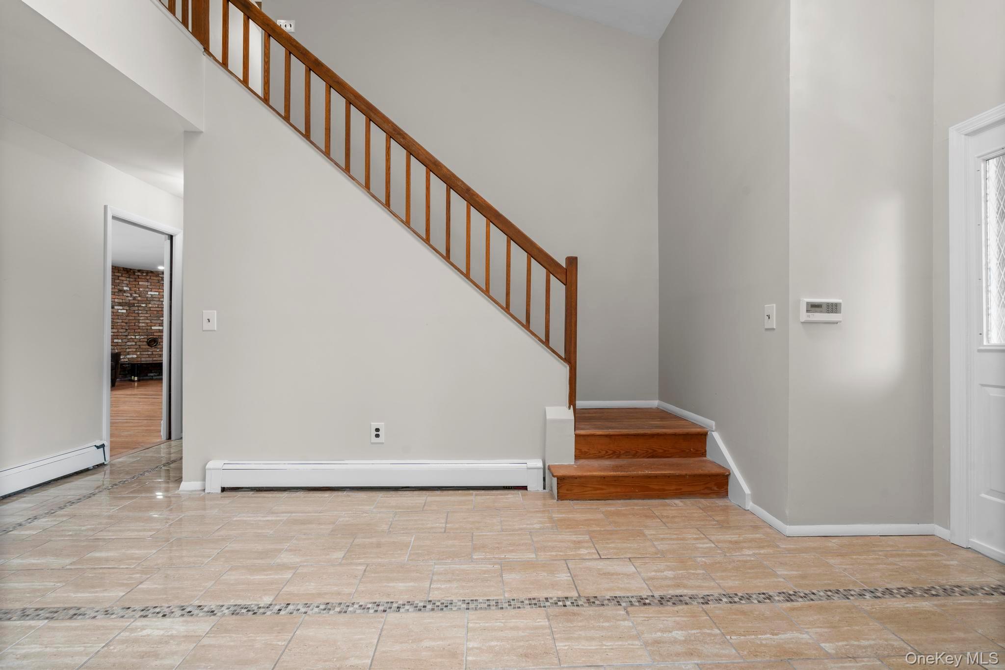 513 Bedford Road Armonk, NY 10504 - Photo 5 of 38 a view of entryway and hall with wooden floor