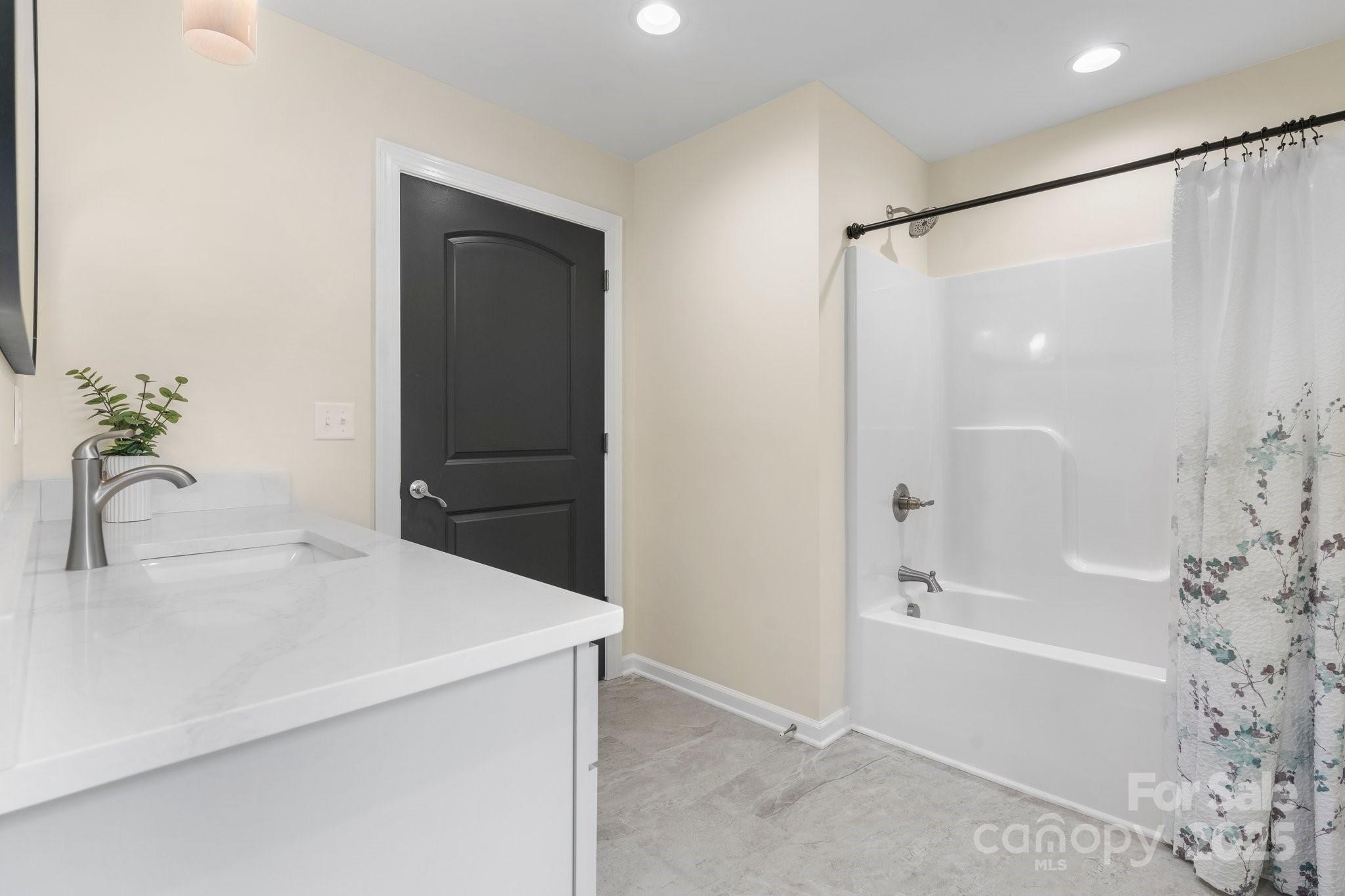 191 Harmony Grove Road Nebo, NC 28761 - Photo 24 of 47 a bathroom with a bathtub and a sink