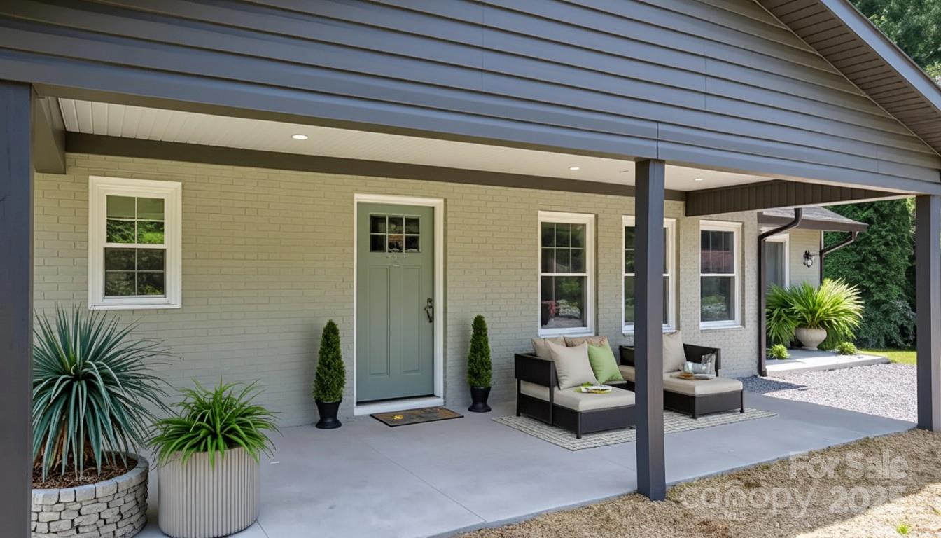 191 Harmony Grove Road Nebo, NC 28761 - Photo 3 of 47 a house view with a seating space