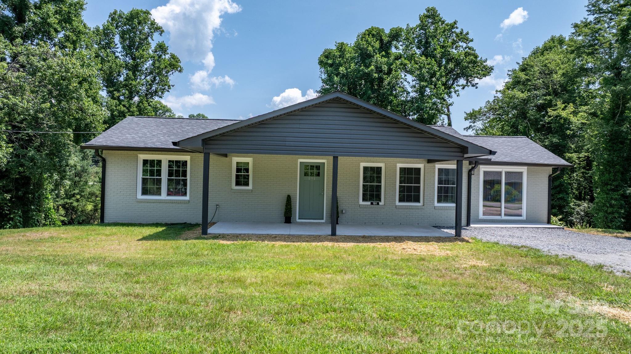 191 Harmony Grove Road Nebo, NC 28761 - Photo 33 of 47 a house that has a big yard with wooden fence