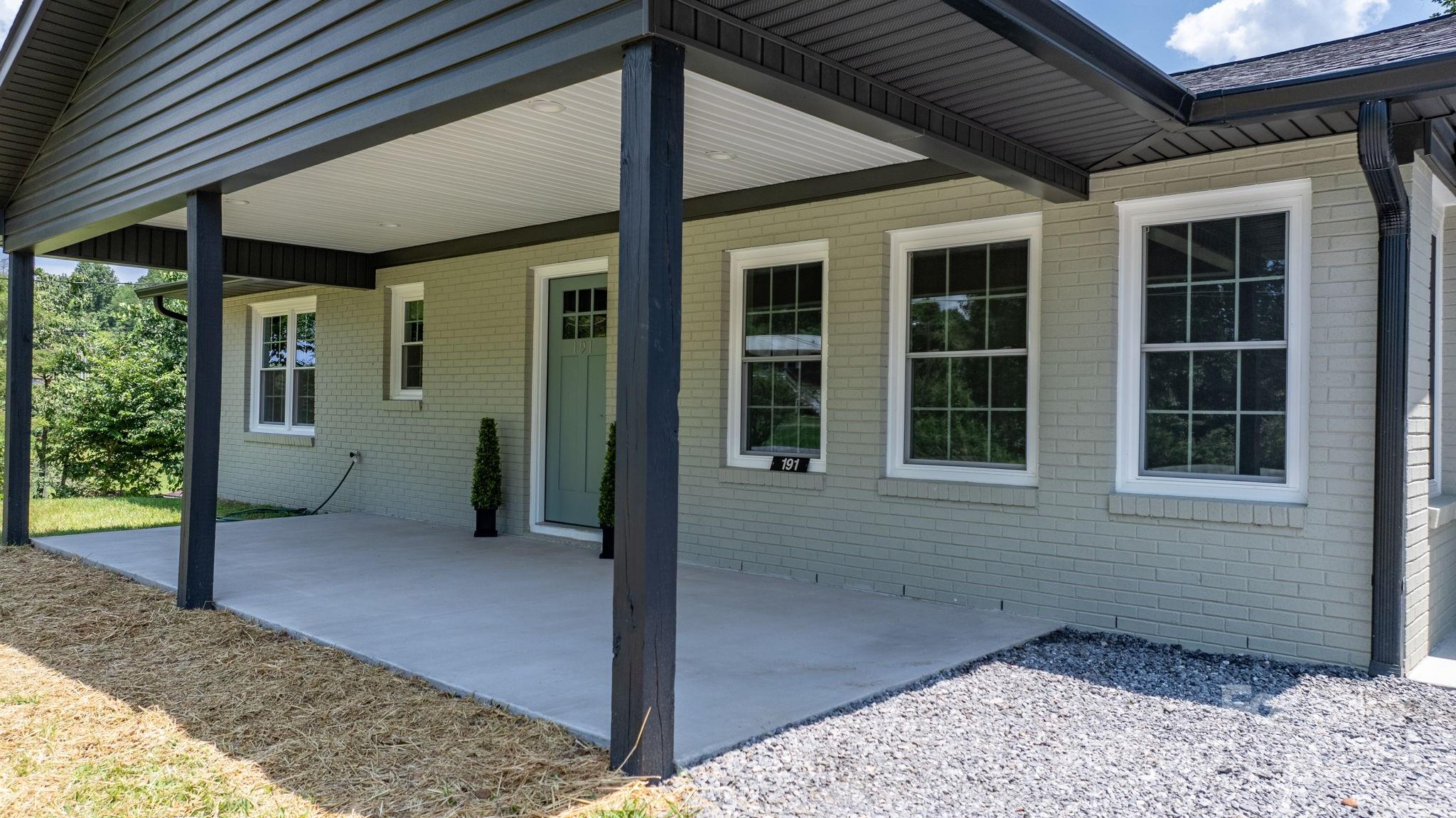 191 Harmony Grove Road Nebo, NC 28761 - Photo 6 of 47 a view of a porch with a bench
