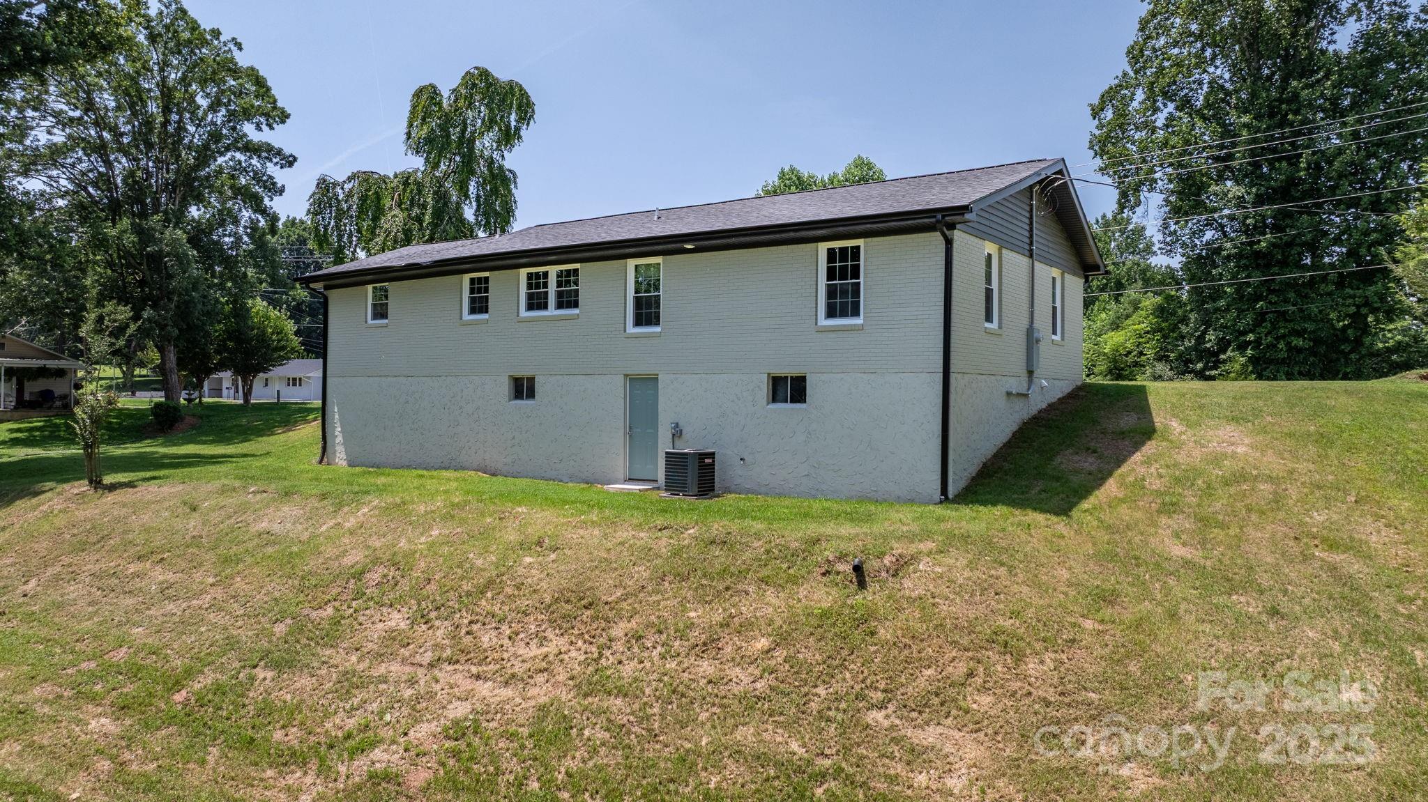 191 Harmony Grove Road Nebo, NC 28761 - Photo 7 of 47 a front view of house with yard