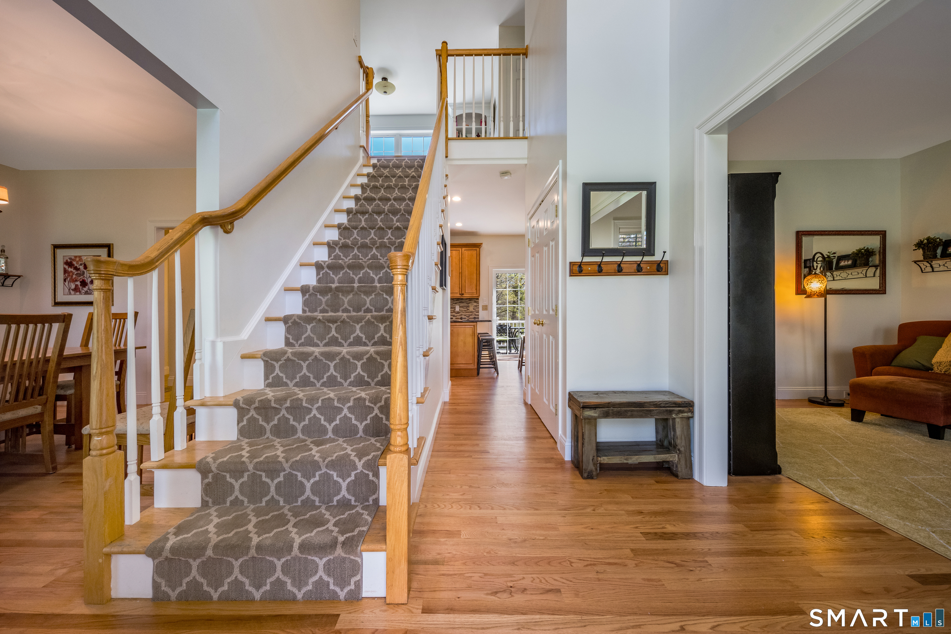 463 Tanner Marsh Road Guilford, CT 06437 - Photo 14 of 40 a view of entryway and hall with wooden floor