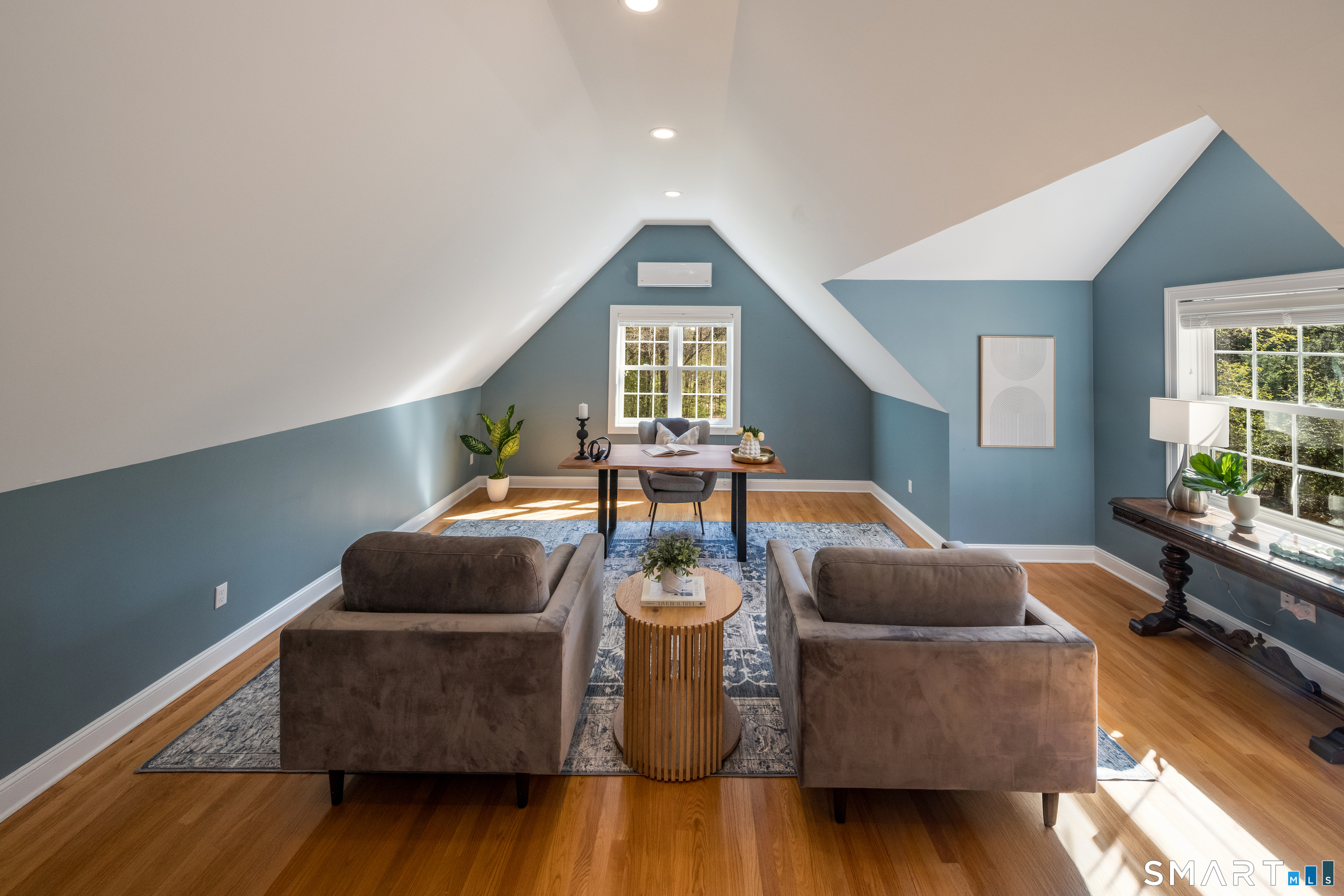 463 Tanner Marsh Road Guilford, CT 06437 - Photo 21 of 40 a living room with furniture and a wooden floor