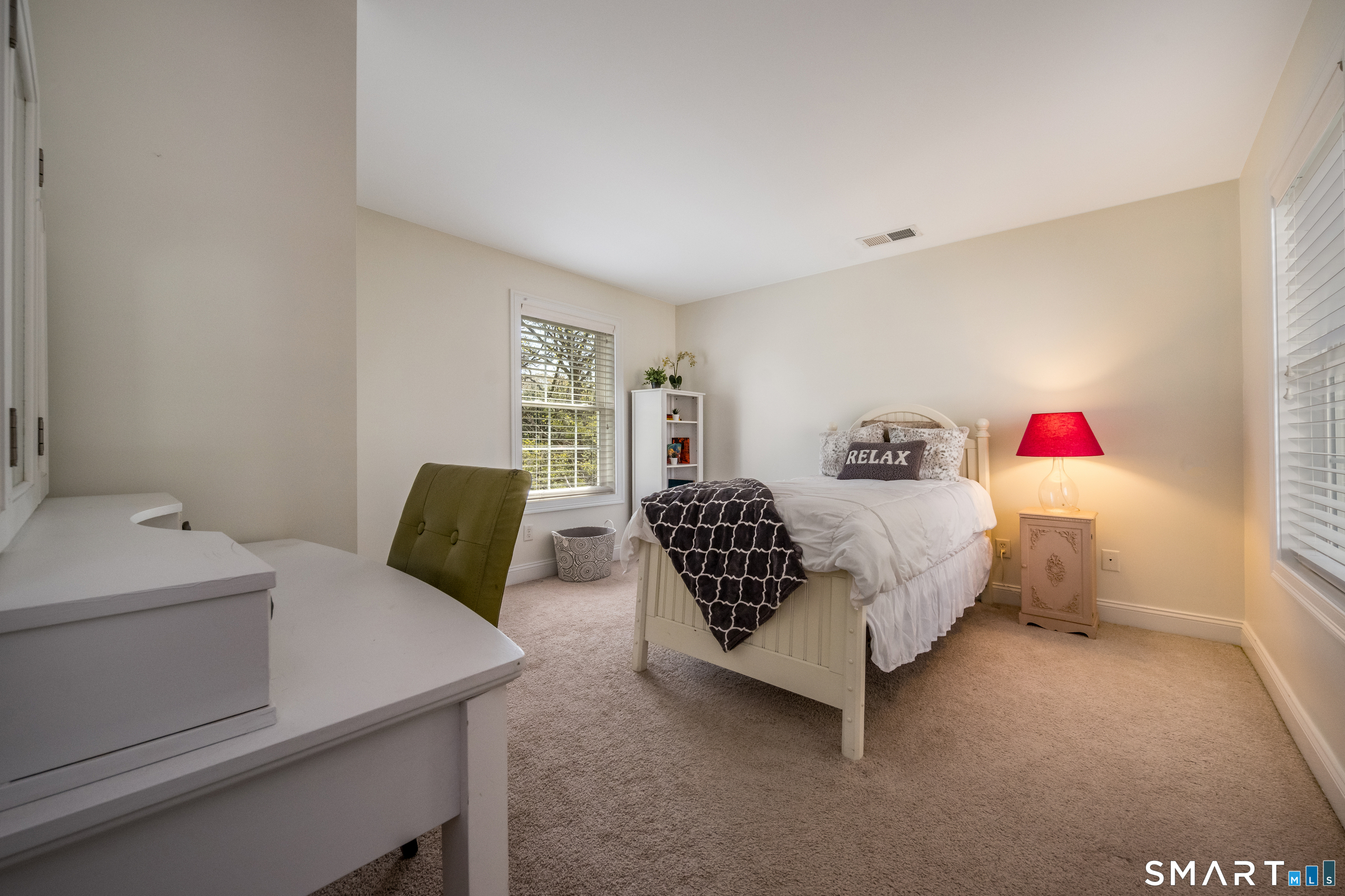 463 Tanner Marsh Road Guilford, CT 06437 - Photo 23 of 40 a bedroom with a bed and a dresser