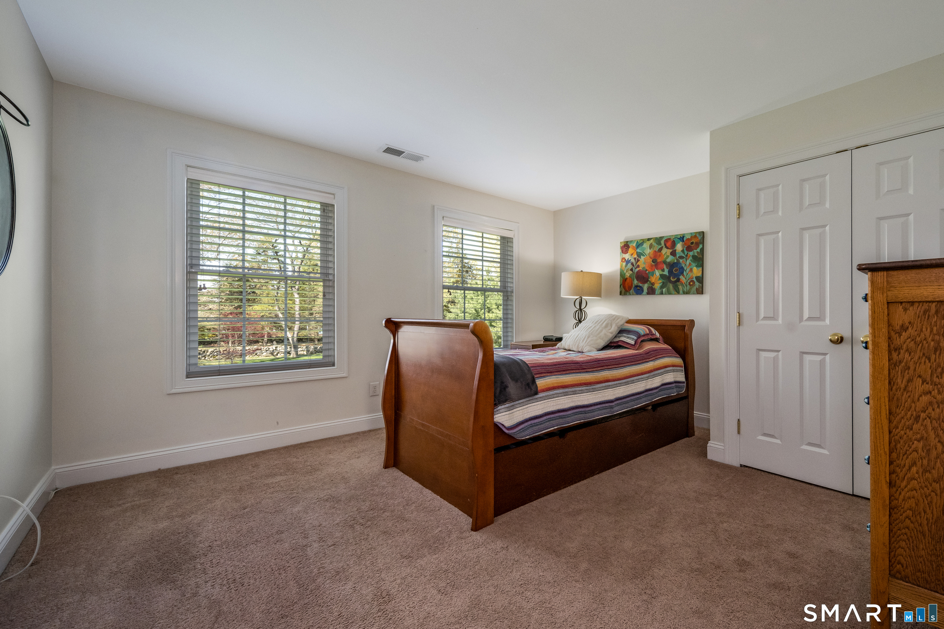 463 Tanner Marsh Road Guilford, CT 06437 - Photo 25 of 40 a living room with furniture and a window