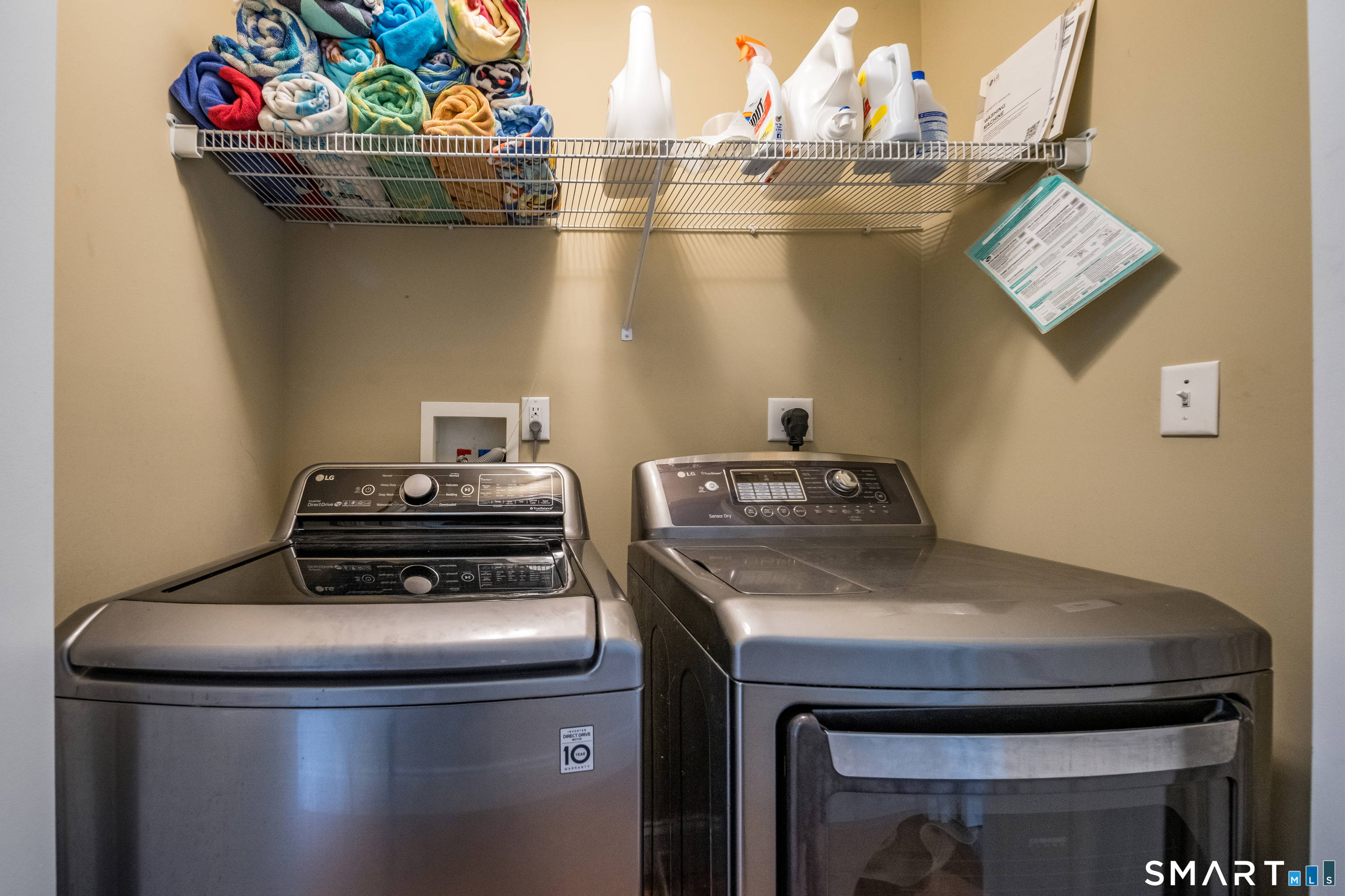 463 Tanner Marsh Road Guilford, CT 06437 - Photo 27 of 40 a kitchen with a stove and a wooden floor