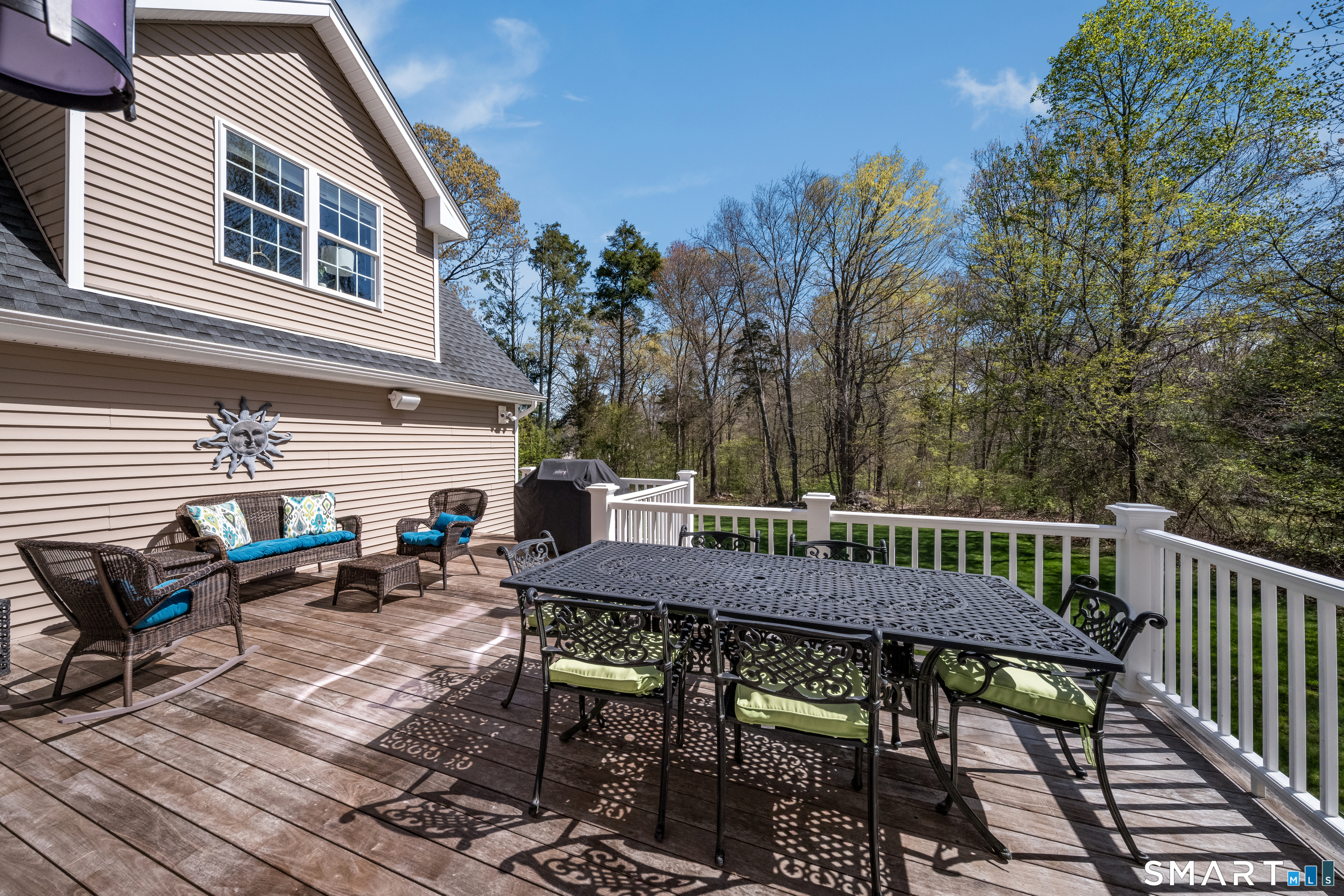 463 Tanner Marsh Road Guilford, CT 06437 - Photo 28 of 40 a view of a patio with a table and chairs