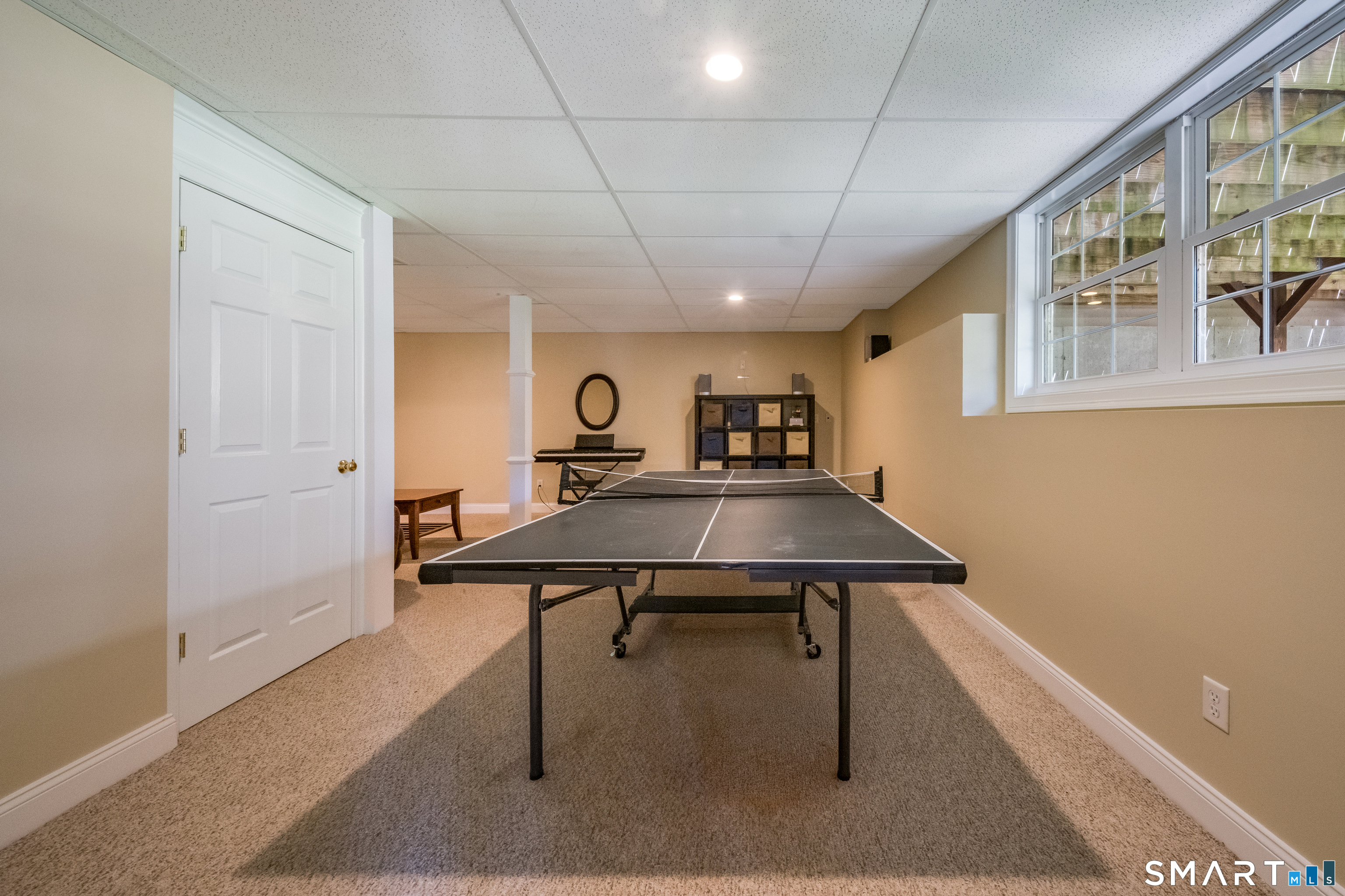 463 Tanner Marsh Road Guilford, CT 06437 - Photo 31 of 40 a view of a room with furniture window and wooden floor