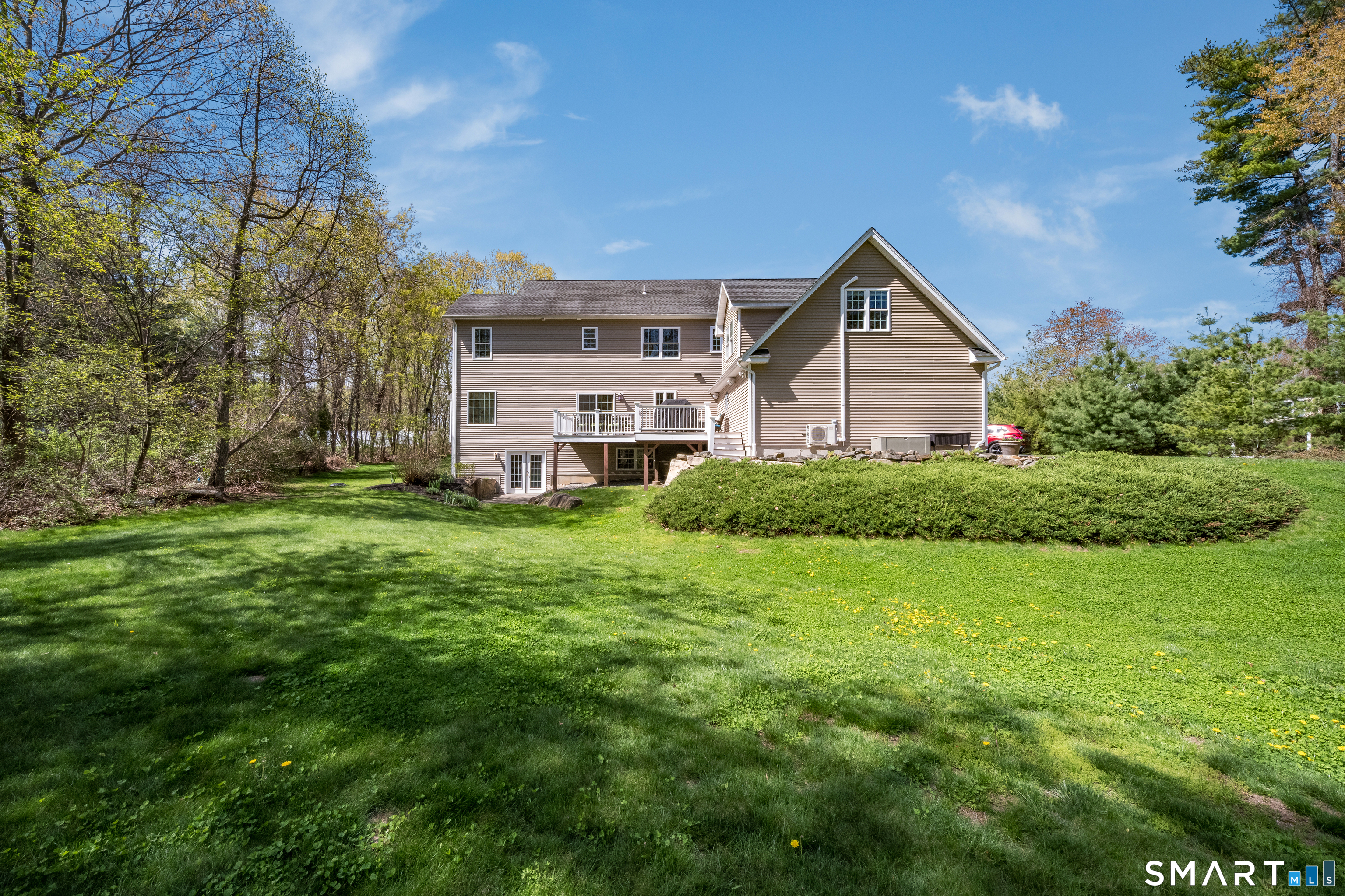 463 Tanner Marsh Road Guilford, CT 06437 - Photo 33 of 40 a house view with a garden space