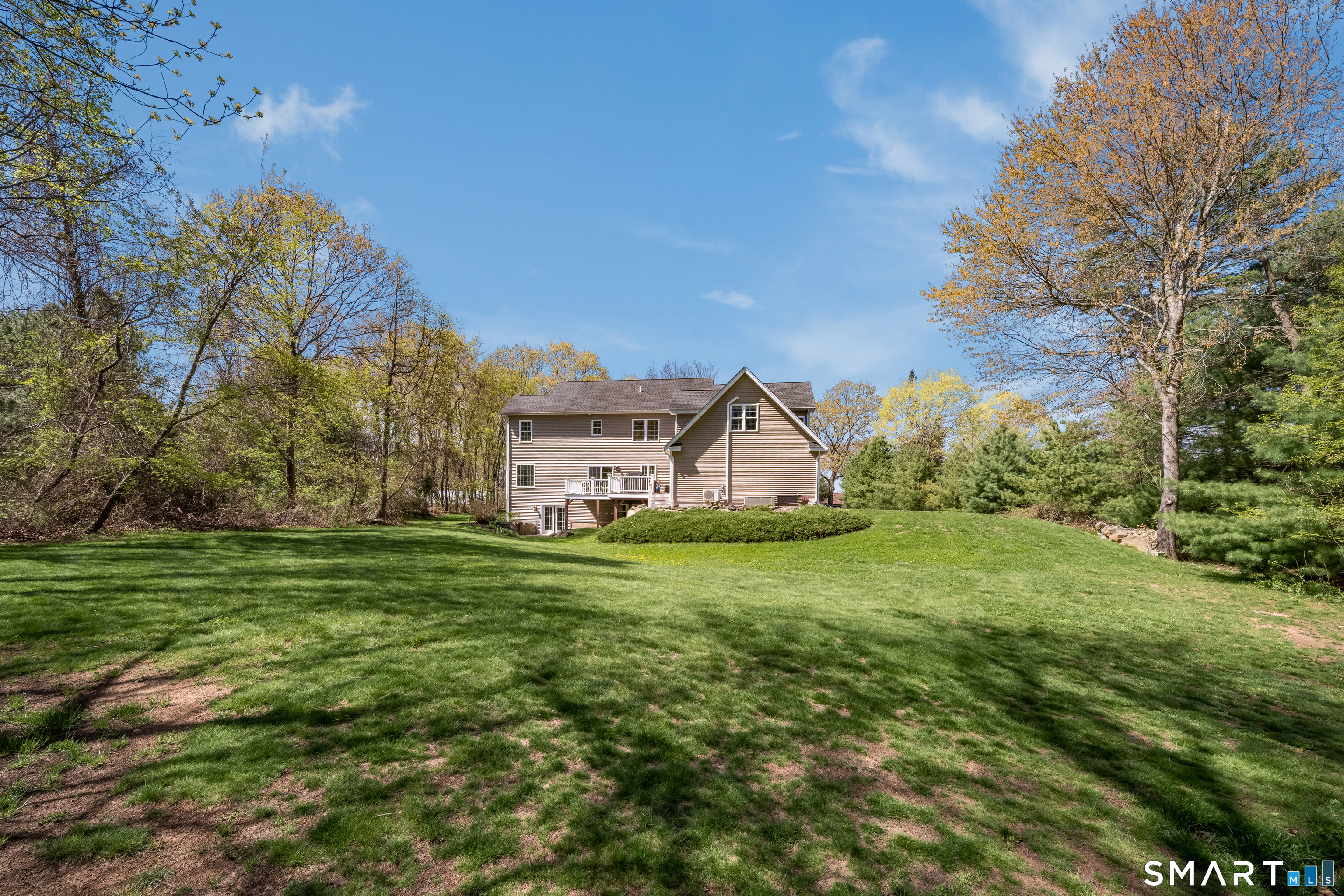 463 Tanner Marsh Road Guilford, CT 06437 - Photo 35 of 40 a view of a house with a big yard