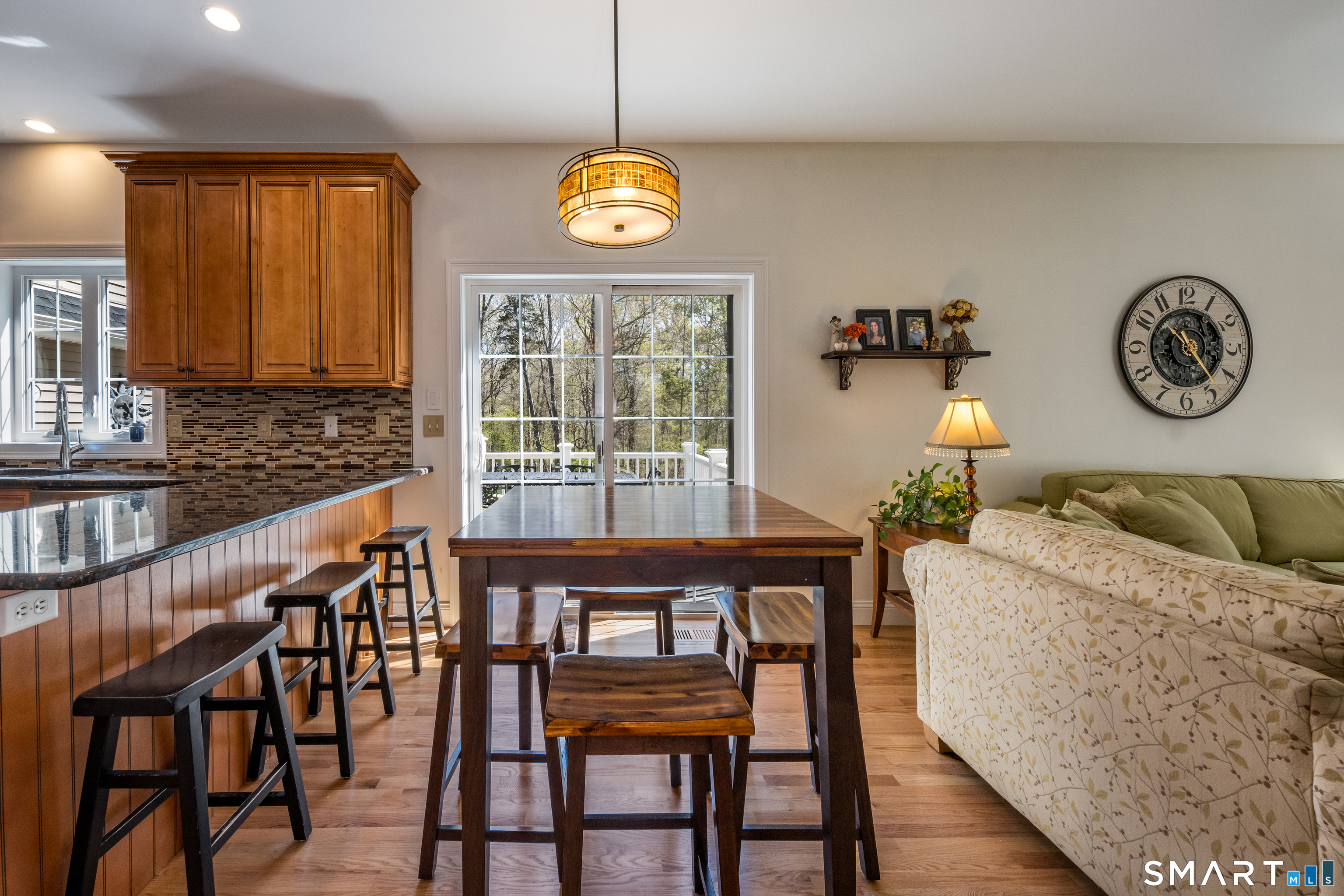 463 Tanner Marsh Road Guilford, CT 06437 - Photo 8 of 40 a view of a dining room with furniture window and wooden floor