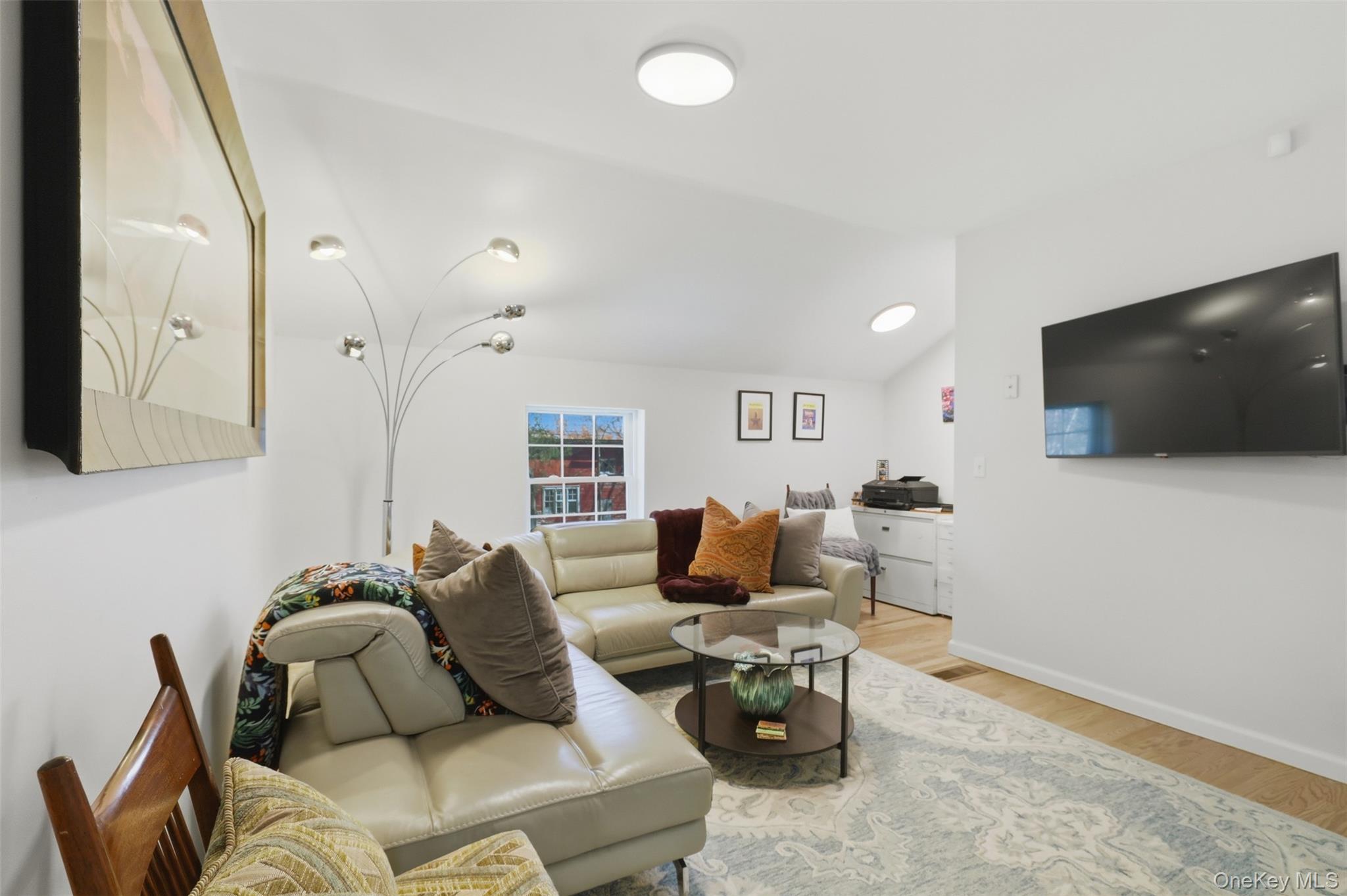 1 Lira Street Wallkill, NY 12589 - Photo 18 of 31 a living room with furniture and a flat screen tv