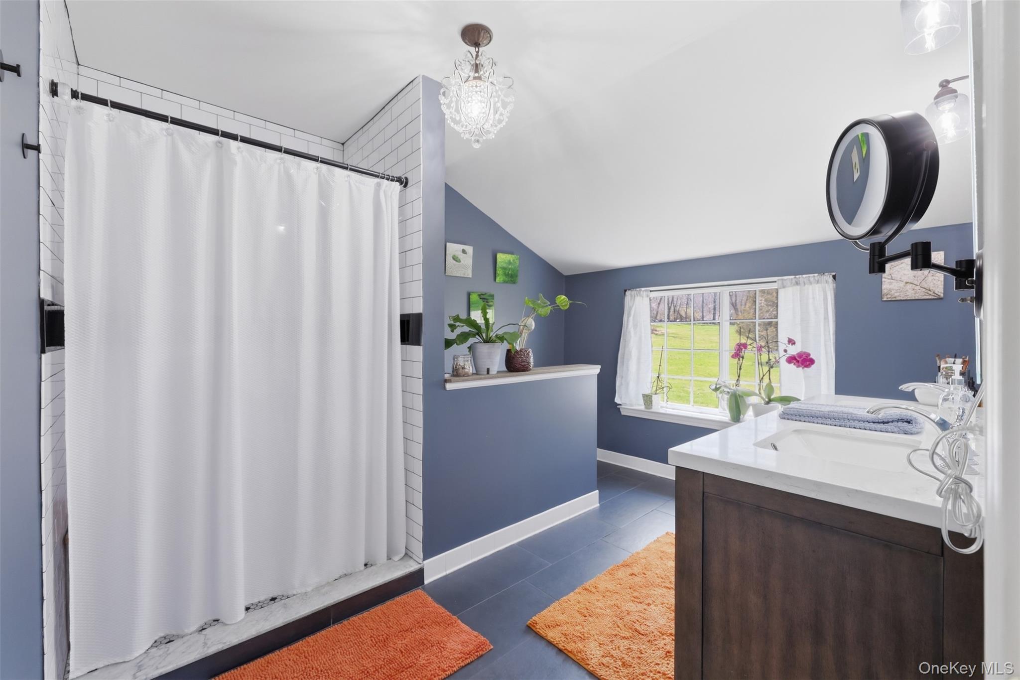 1 Lira Street Wallkill, NY 12589 - Photo 23 of 31 a bathroom with a sink a mirror and a shower curtain