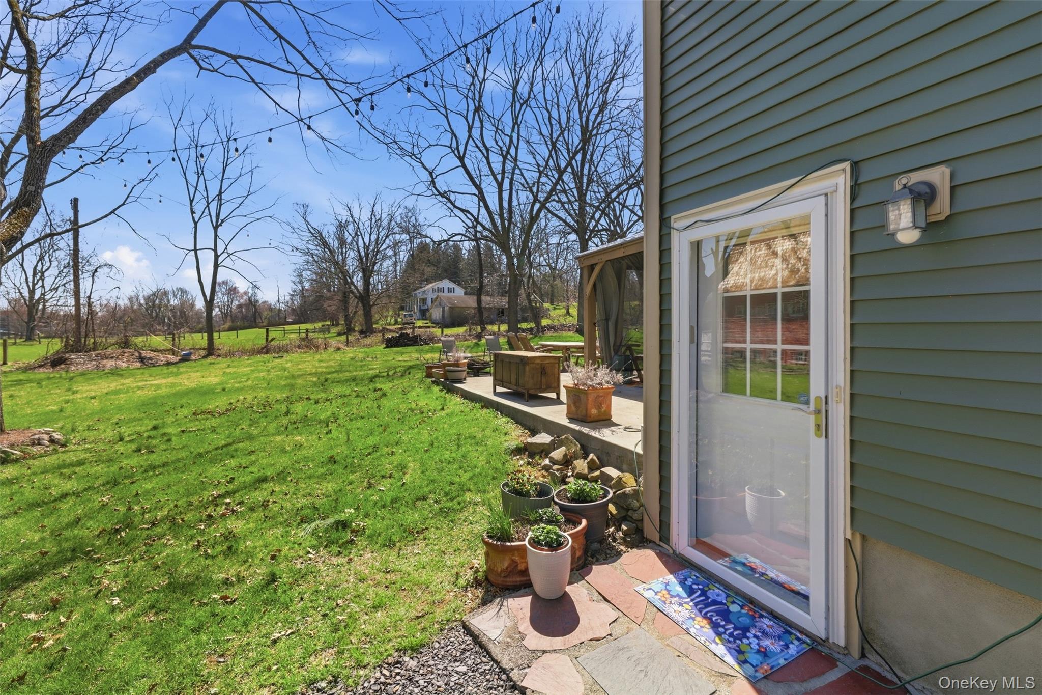 1 Lira Street Wallkill, NY 12589 - Photo 25 of 31 a view of a house with backyard and sitting area