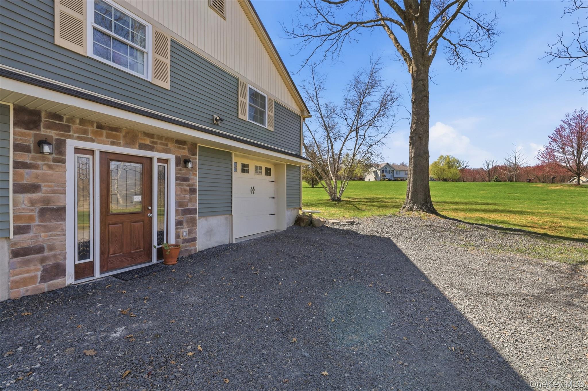 1 Lira Street Wallkill, NY 12589 - Photo 4 of 31 a view of a house with backyard and trees