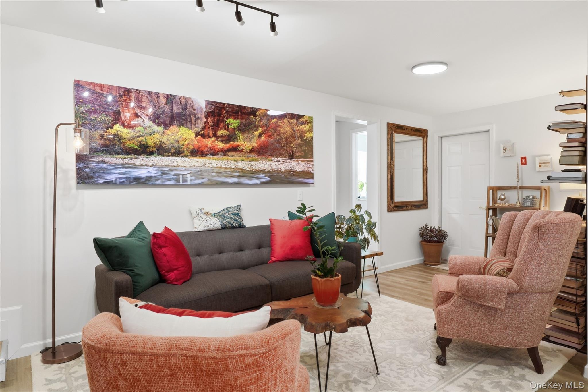 1 Lira Street Wallkill, NY 12589 - Photo 5 of 31 a living room with furniture and a painting on the wall