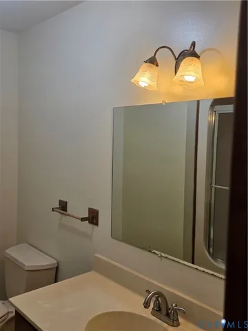 a view of a hallway with a chandelier