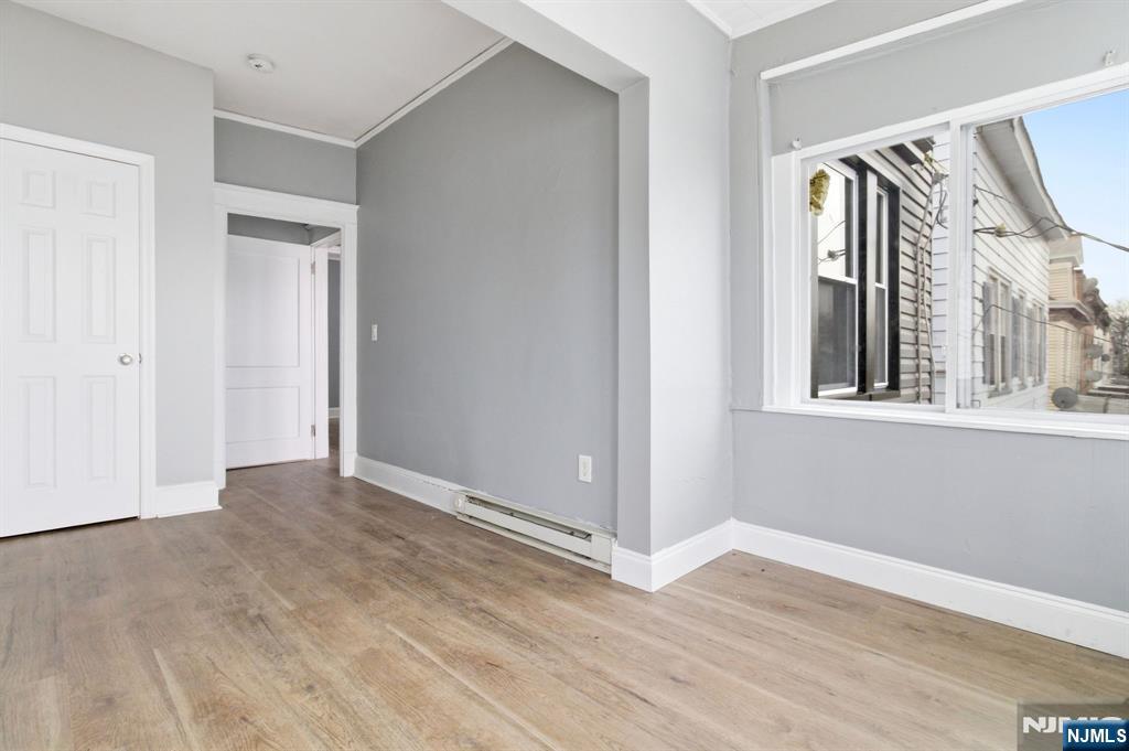 76 Grace Street Irvington, NJ 07111 - Photo 15 of 20 a view of an entryway with wooden floor