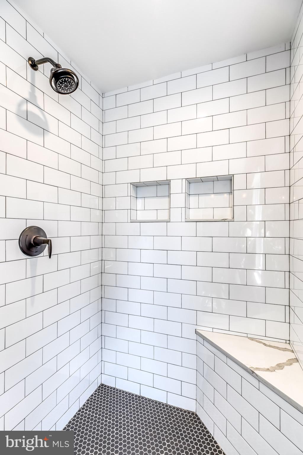 407 Hollen Road Baltimore, MD 21212 - Photo 22 of 41 a bathroom with a bathtub and shower