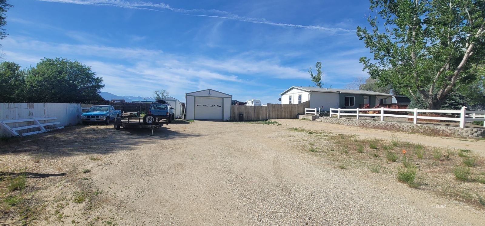 933 Spring Valley Parkway Spring Creek, NV 89815 - Photo 2 of 27 a view of a house with a patio