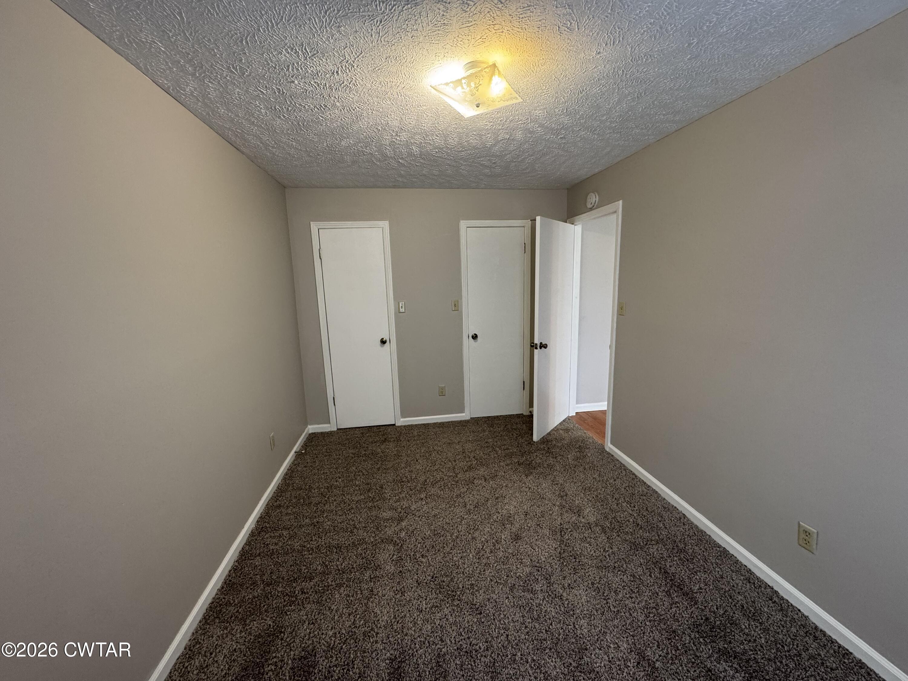 45 Ellendale Cove Jackson, TN 38305 - Photo 11 of 22 an empty room with windows