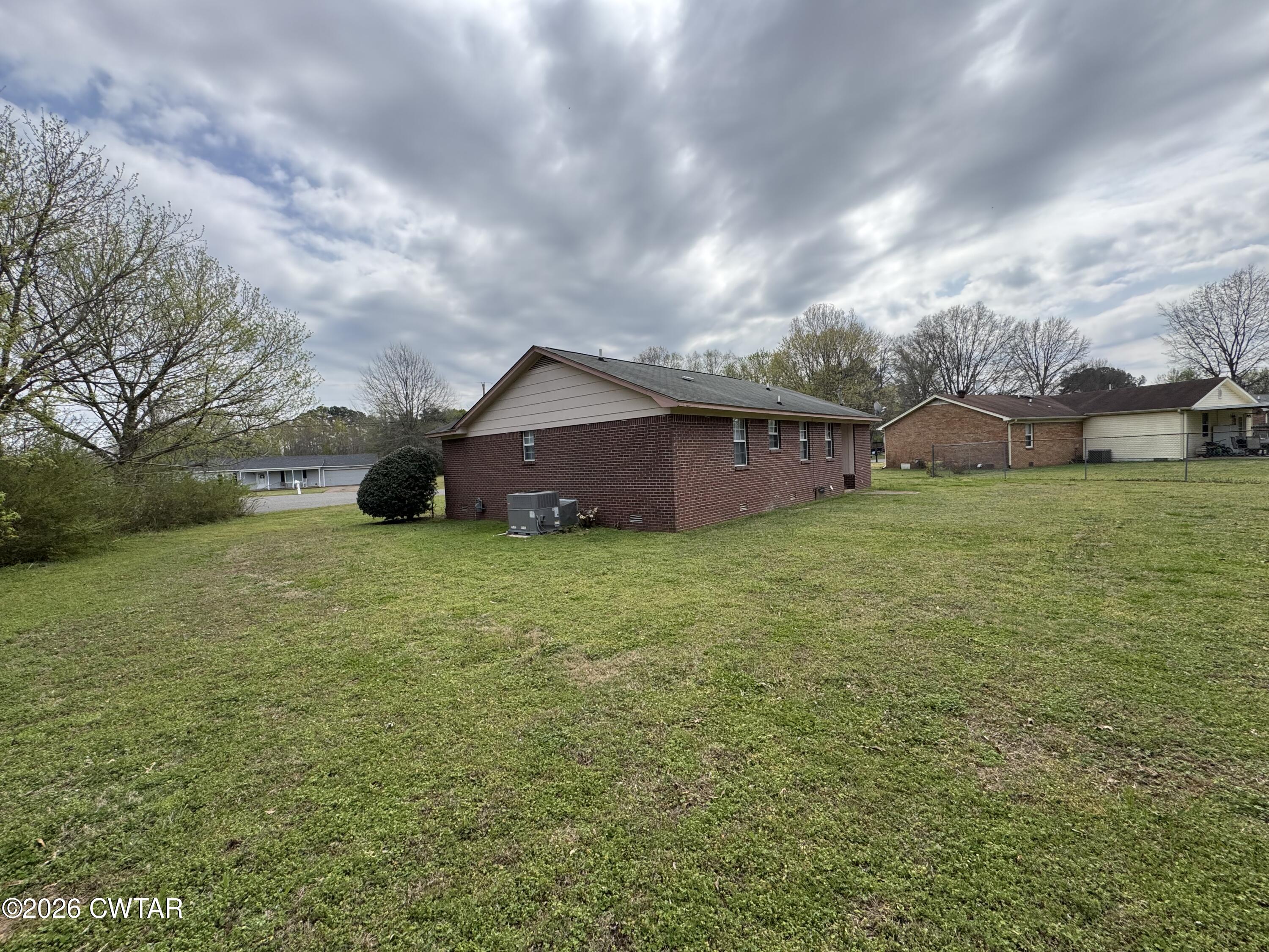 45 Ellendale Cove Jackson, TN 38305 - Photo 17 of 22 a view of a house with a yard