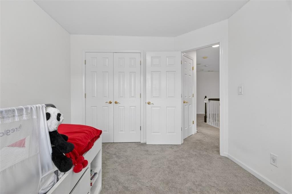 3210 Warbler Way Cumming, GA 30041 - Photo 27 of 45 a view of a room with furniture and equipment
