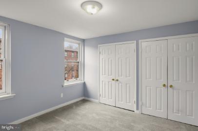 636 Portland Street Baltimore, MD 21230 - Photo 7 of 15 an empty room with windows