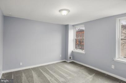 636 Portland Street Baltimore, MD 21230 - Photo 8 of 15 an empty room with windows