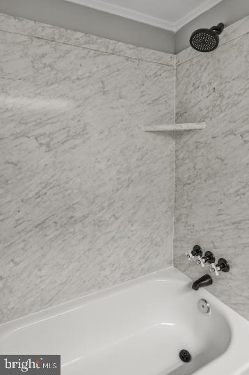 636 Portland Street Baltimore, MD 21230 - Photo 9 of 15 a bathroom with a bathtub