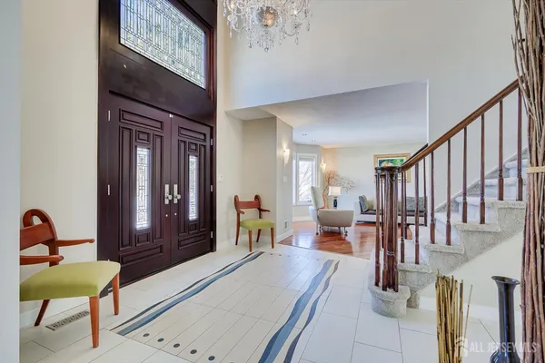 a kitchen with a stove a refrigerator and a sink