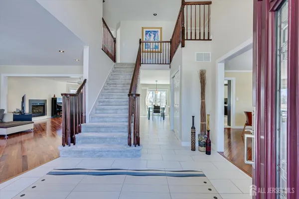 a kitchen with granite countertop a sink stainless steel appliances and cabinets