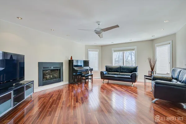 a kitchen with a stove and a white cabinet