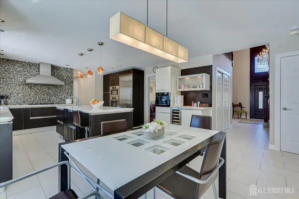 a bedroom that has a bed and a desk in it