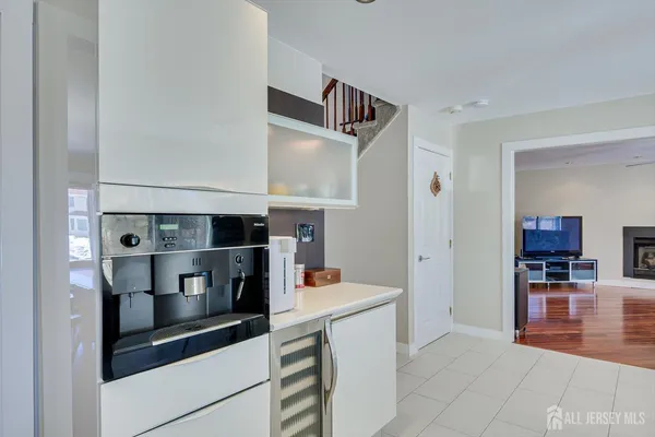 a white bath tub sitting next to a window
