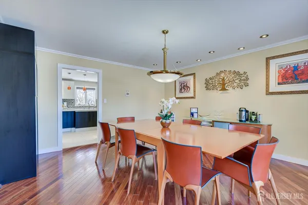 a view of a chairs and table in the patio