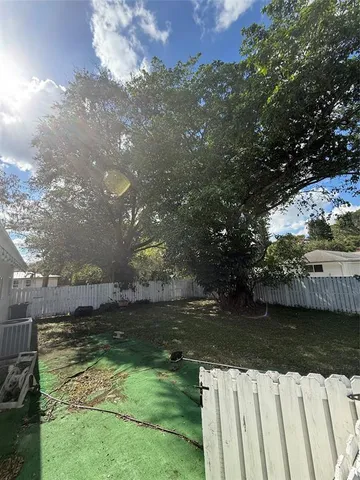 a view of lake with green space