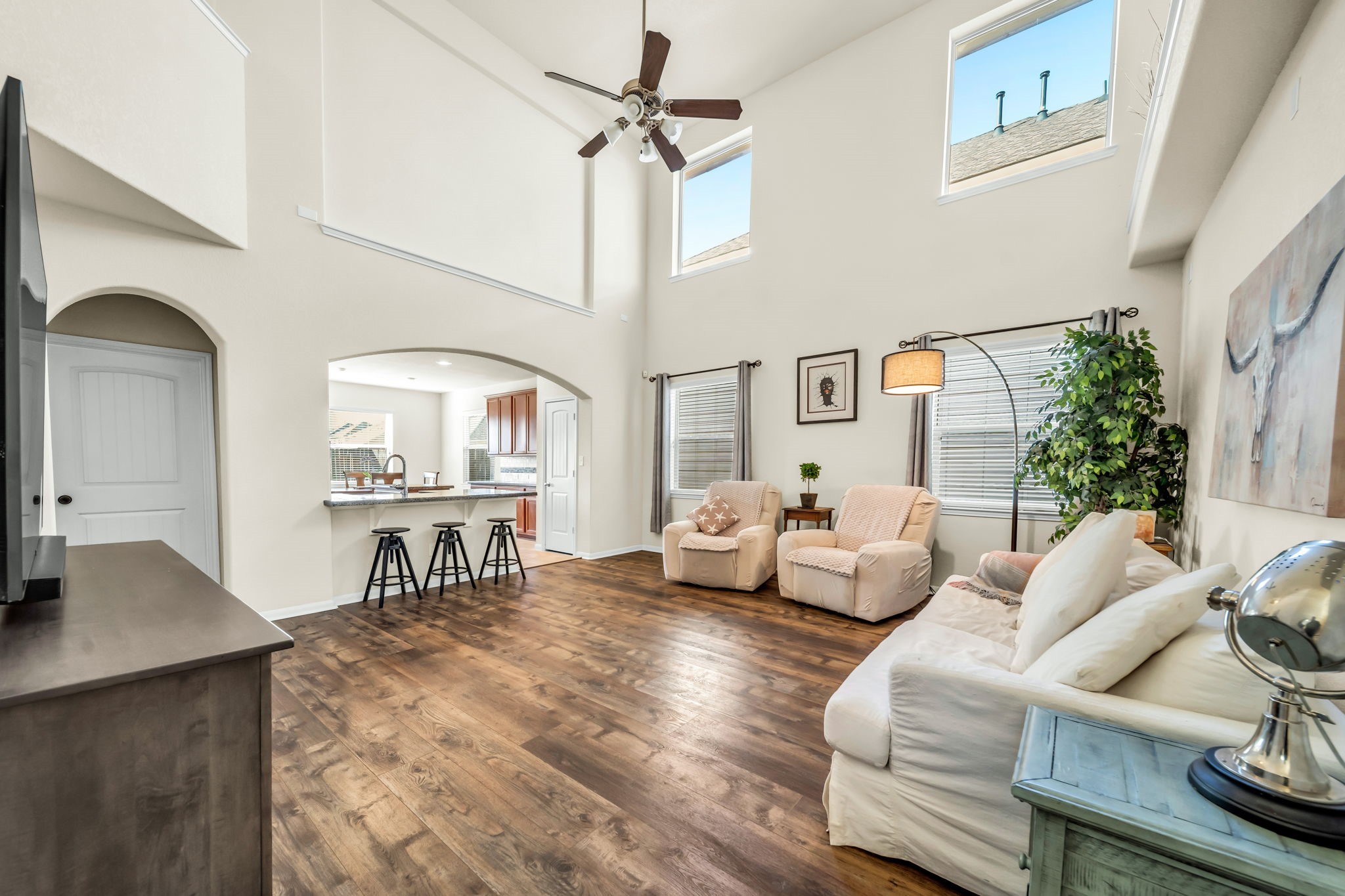 14212 Portrait Court Houston, TX 77045 - Photo 4 of 27 Flooded with natural light, this space feels bright and inviting.