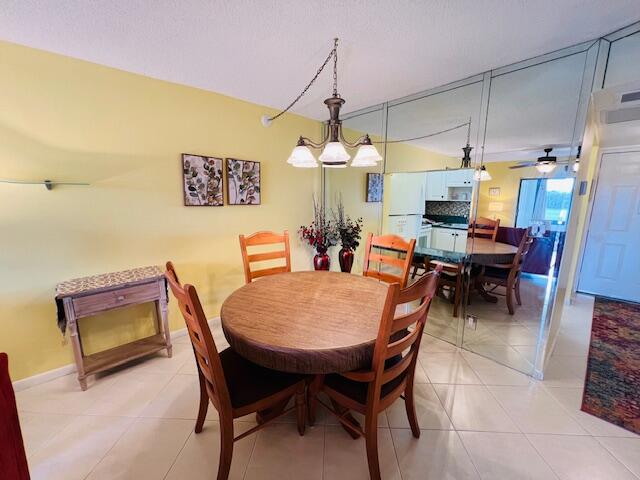 9300 Southwest 8th Street, Unit 218 Boca Raton, FL 33428 - Photo 5 of 14 Dining area