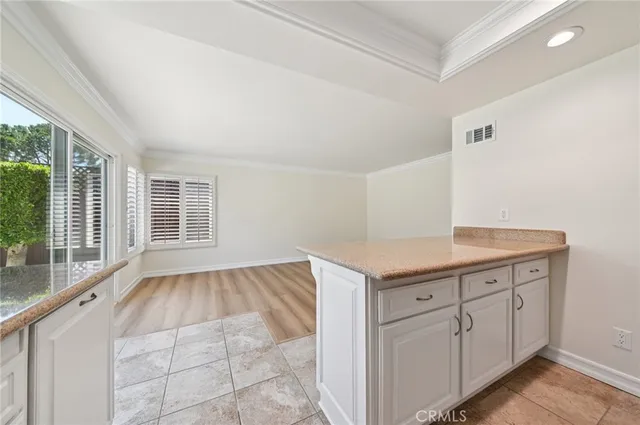 a view of cabinets with wooden floor
