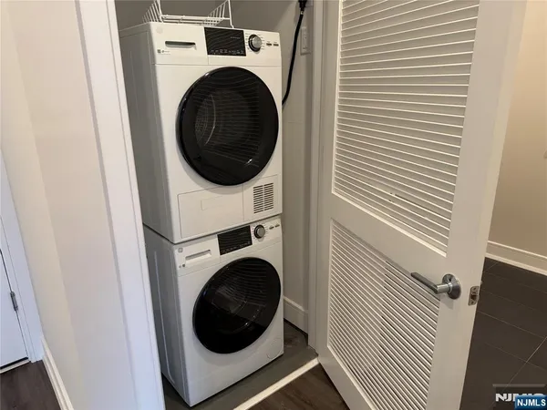 a close up view of a washer and dryer in a bathroom