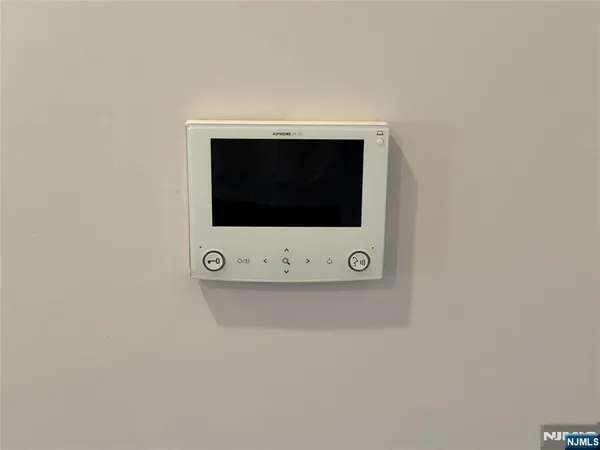a view of an entryway with a floor to ceiling window