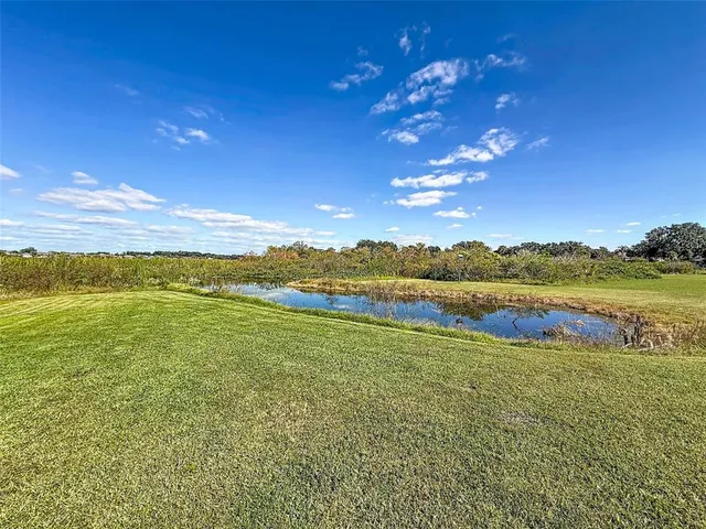 a living room filled with furniture and a table