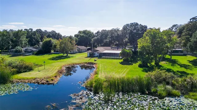 a bedroom with bed and window