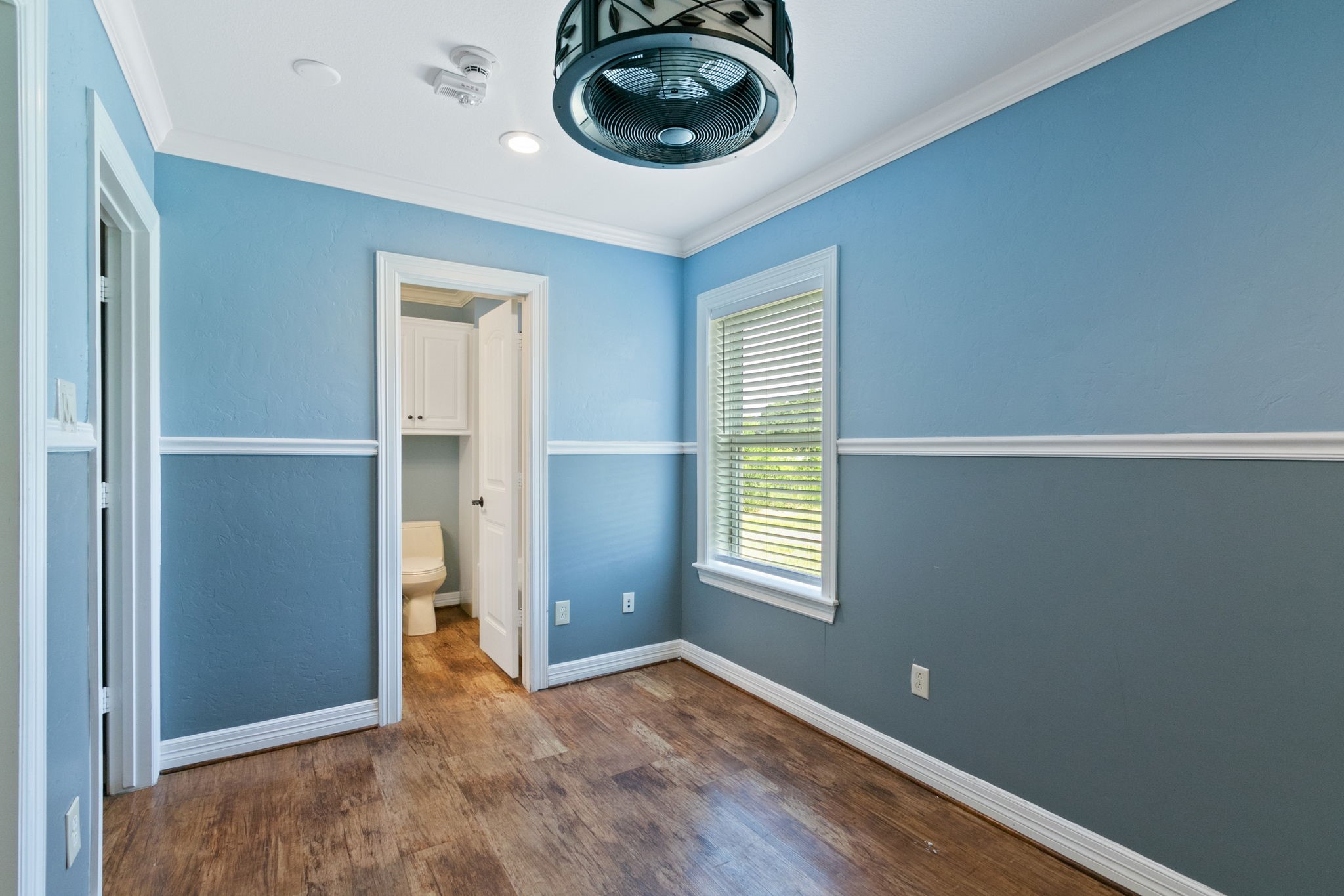 17018 Grant Road Cypress, TX 77429 - Photo 26 of 50 an empty room with closet and windows