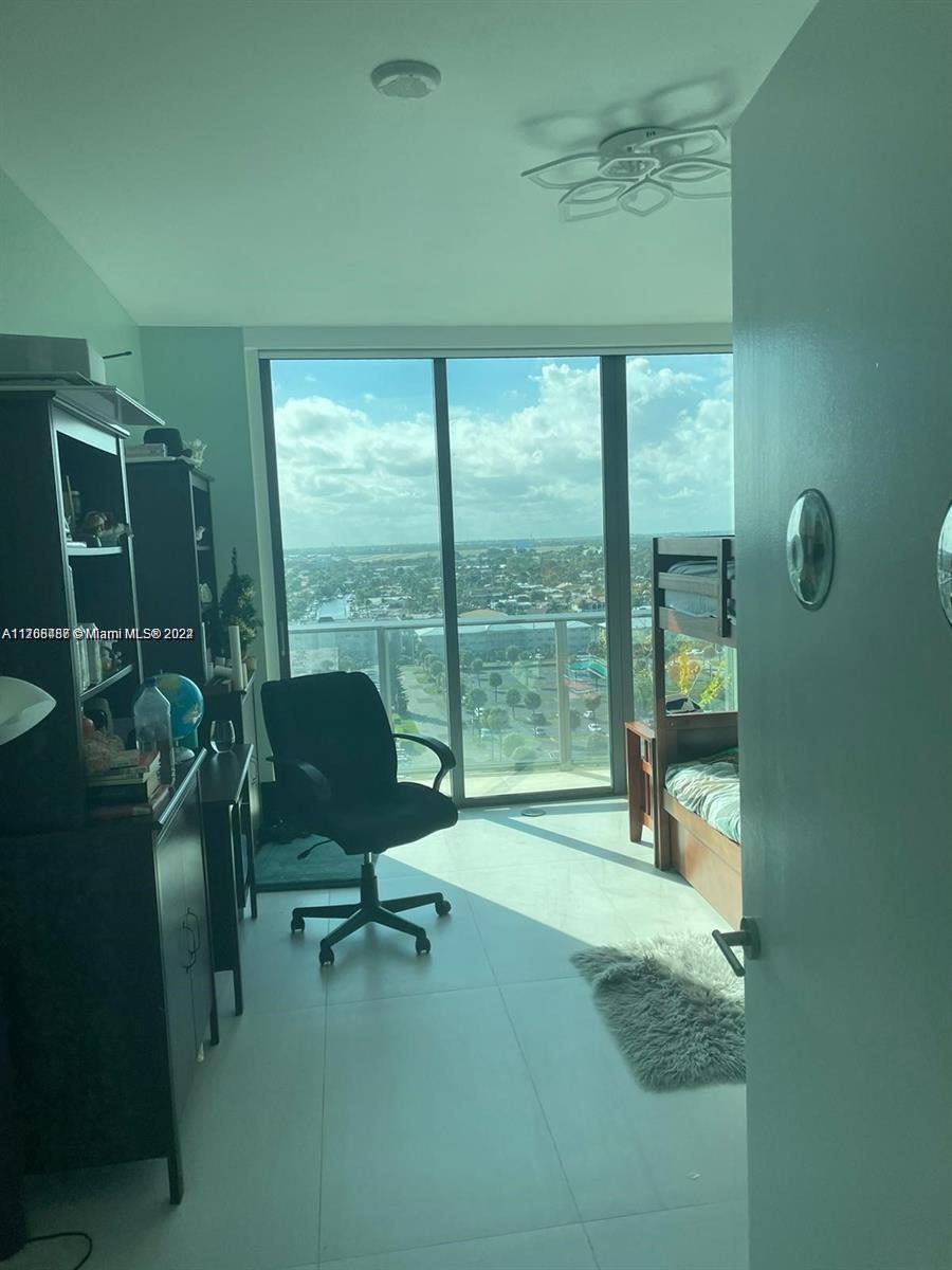 730 North Ocean Boulevard, Unit 1205 Pompano Beach, FL 33062 - Photo 9 of 19 a view of a livingroom with chairs