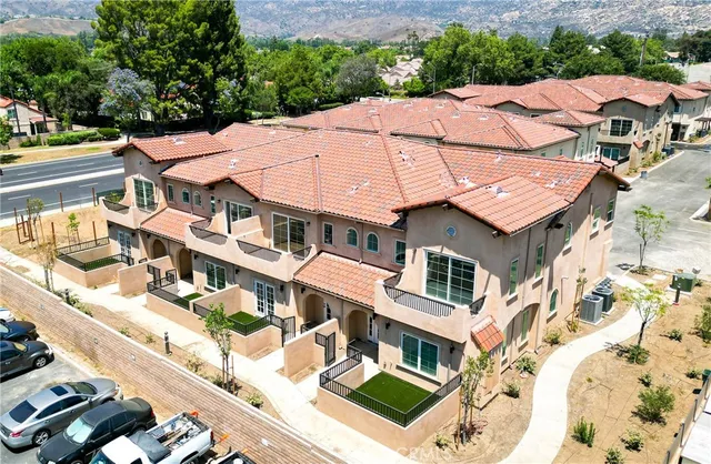 a aerial view of a house with a yard
