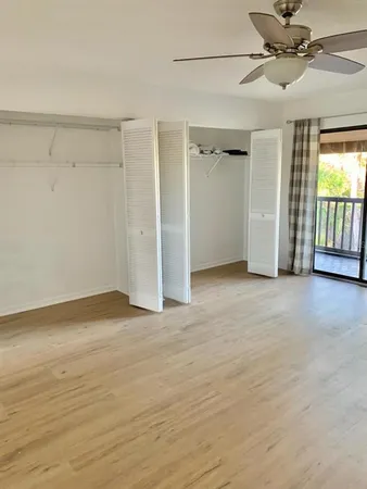 a view of a room with a large window